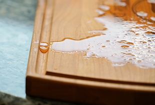 wood cutting board with juice groove, cutting board juice groove, juice groove benefits, butcher block juice groove, butcher block boards